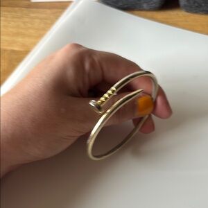 Elegant Gold Nail Bracelet